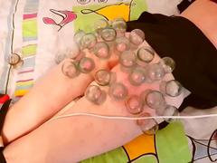 Mistress teases dude's ass with a bunch of suction cups